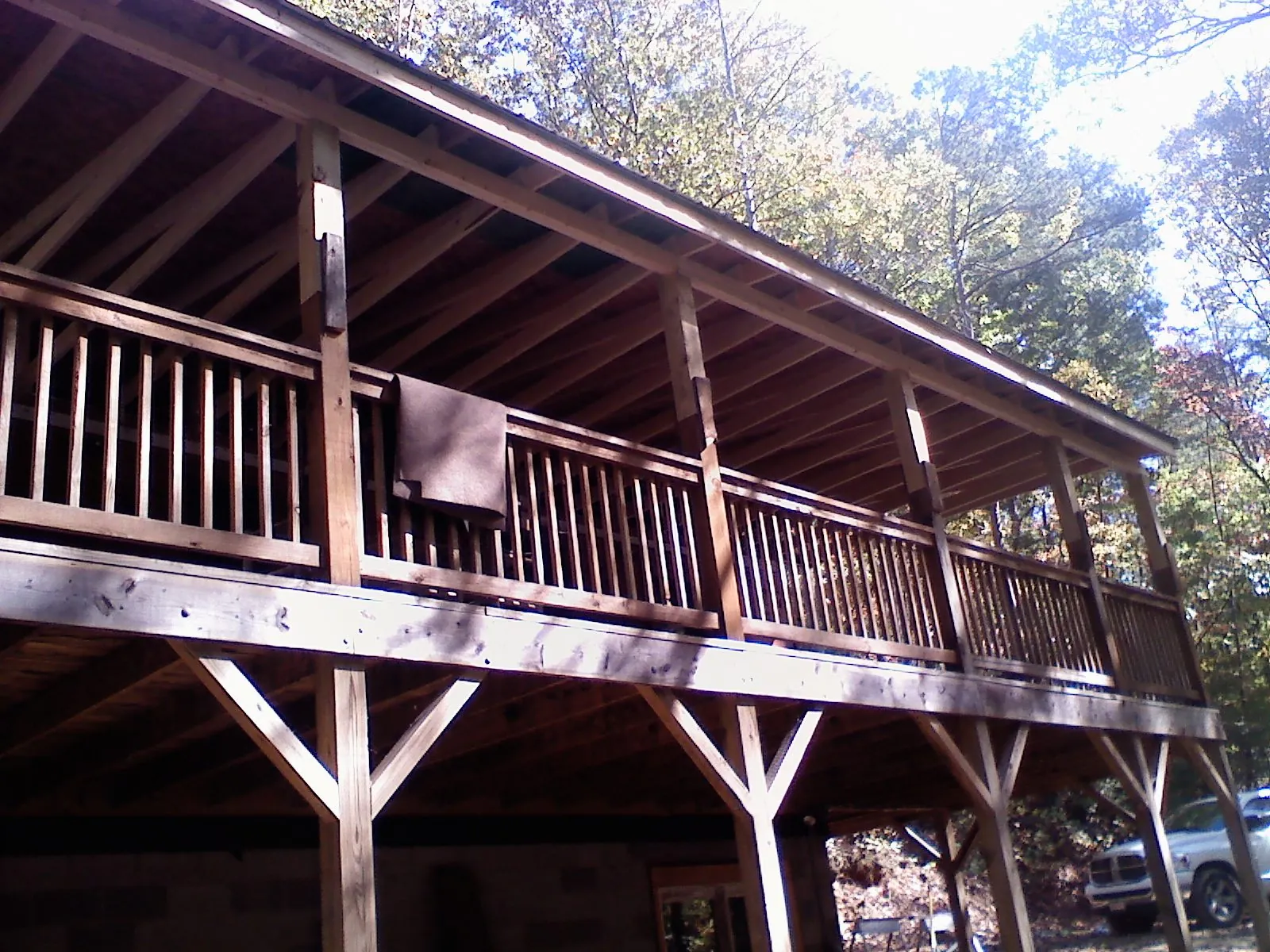 Timber framing under a new elevated porch and deck — Roof Leak Repair in Rensselaer by Roofing Brothers